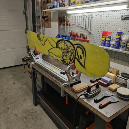 Libtech snowboard in waxing mode